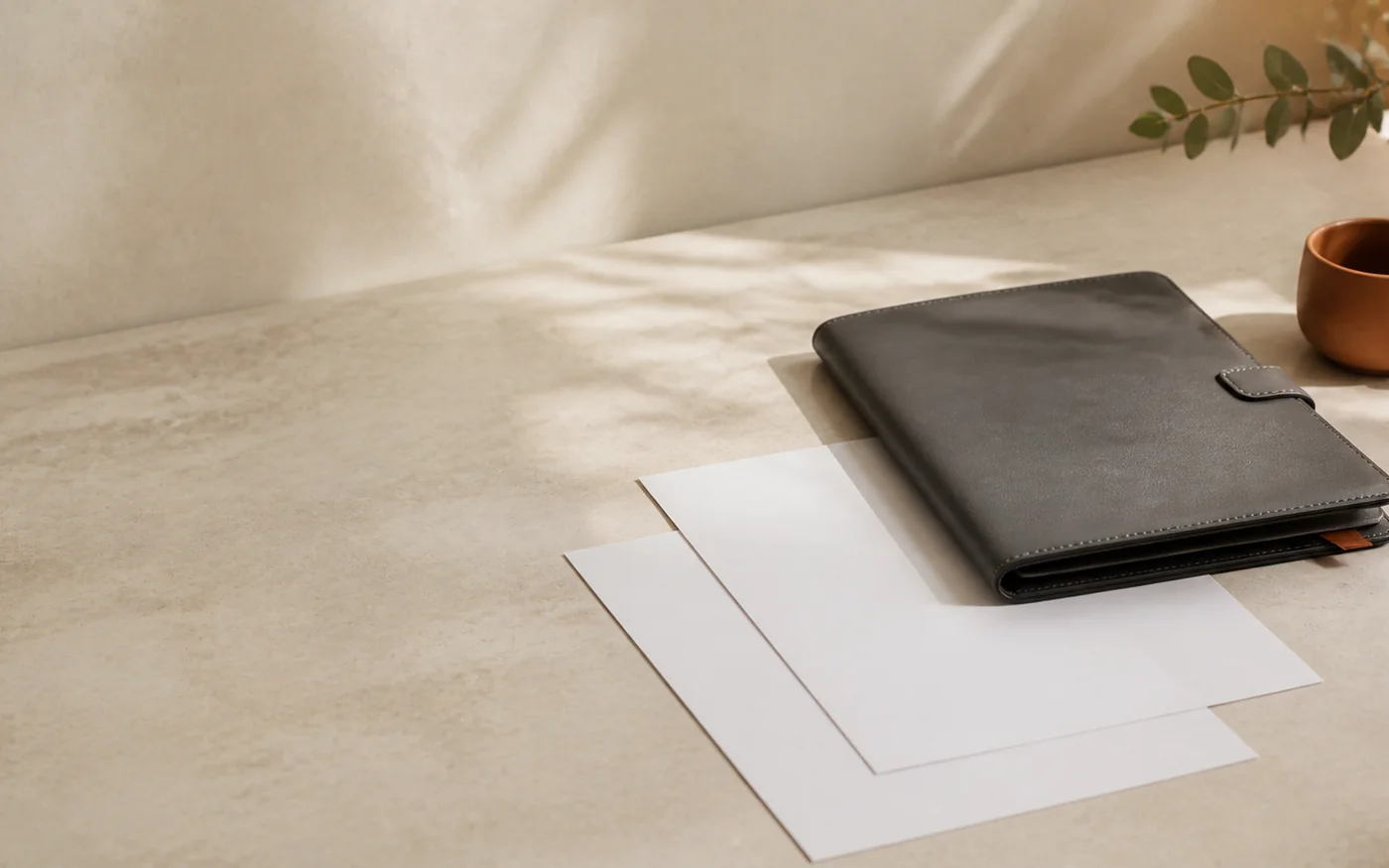 Loan and compliance documents arranged in a professional folio